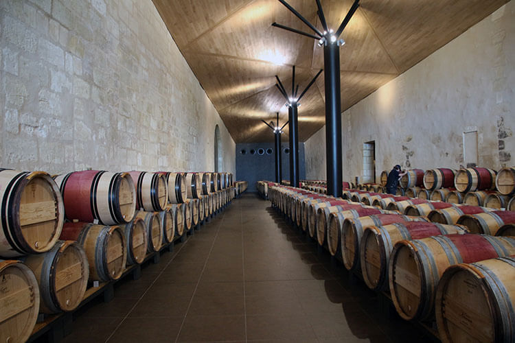 Barrel room at Chateau Kirwan
