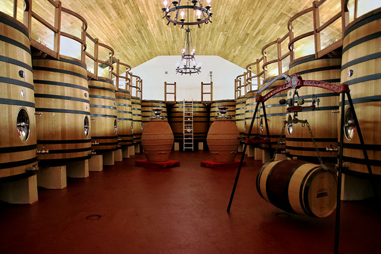 Wooden vats are used in the winery for fermenting the wine at Château Fombrauge