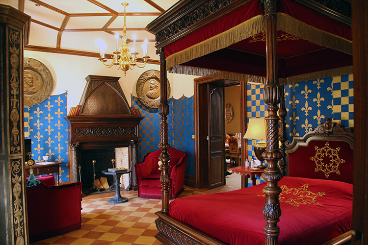 A four poster bed holds court in the Michel de Montaigne room