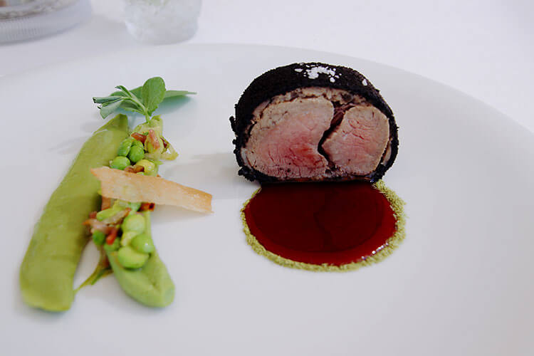 Veal filet with green peas at Restaurant Lalique at Chateau Lafaurie Peyraguey