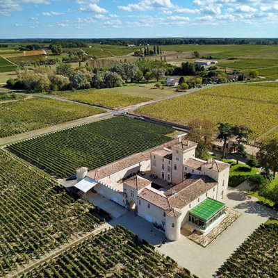 Aerial drone photo of the small castle and surrounding vineyards at Chateau Lafaurie Peyraguey
