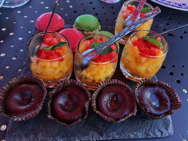 The platter of desserts with macaron ice cream sandwiches, fruit cups with mint and mini chocolate fondants at Chateau Sigalas Rabaud