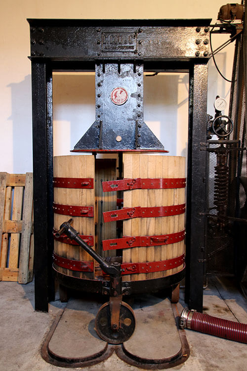 The historic press at Chateau Sigalas Rabaud, which is still used to press the Botrytis grapes