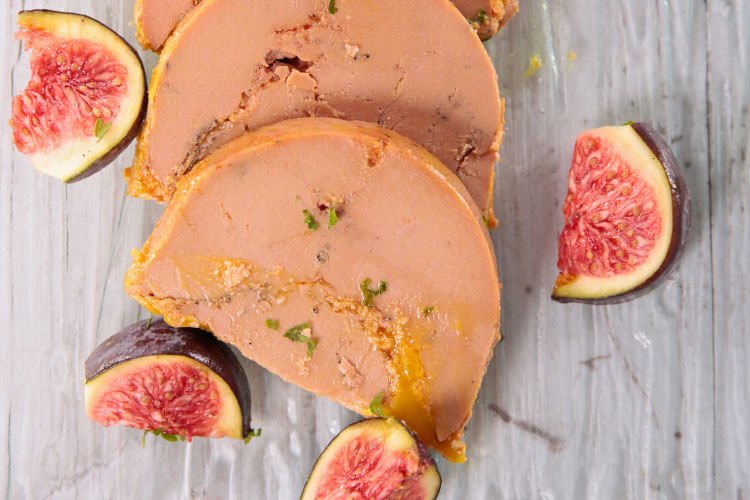 Sliced foie gras with quartered figs