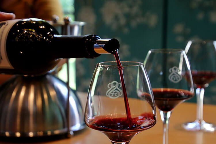 Château Soutard being poured in to a wine glass 