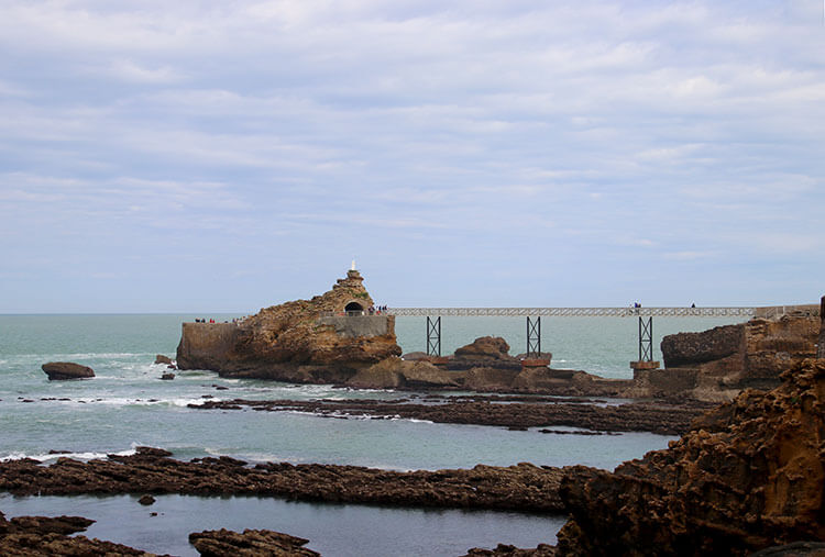 View of the Virgin Rock and metal bridge connecting it to the coast
