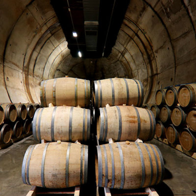 Wine barrels inside the diesel fuel bunker at Moon Harbour Distillery