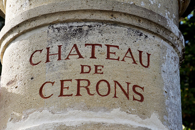 Château de Cérons etched in to a limestone pillar at the entrance to the château