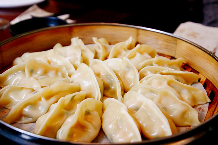 A bamboo steamer of wontons at Hutong restaurant in Bordeaux