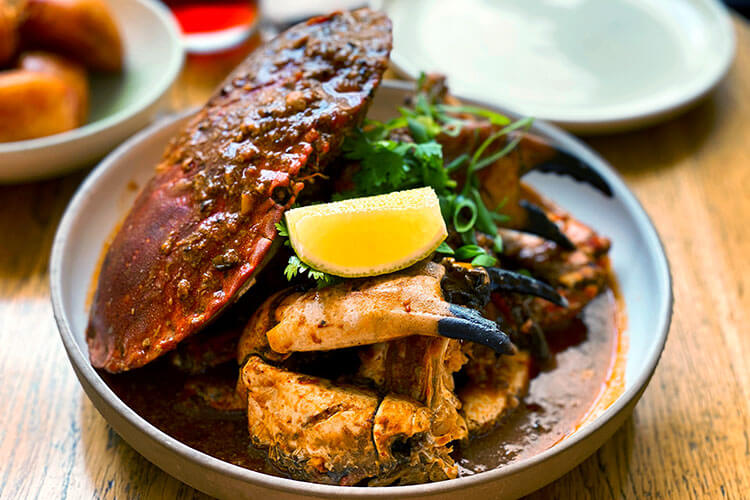 Chilli crab served as a whole crab in a chilli sauce at Hutong restaurant in Bordeaux