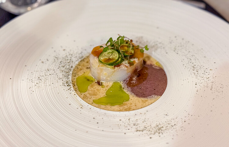 Halibut with azuki beans and kalamata olives at INIMA